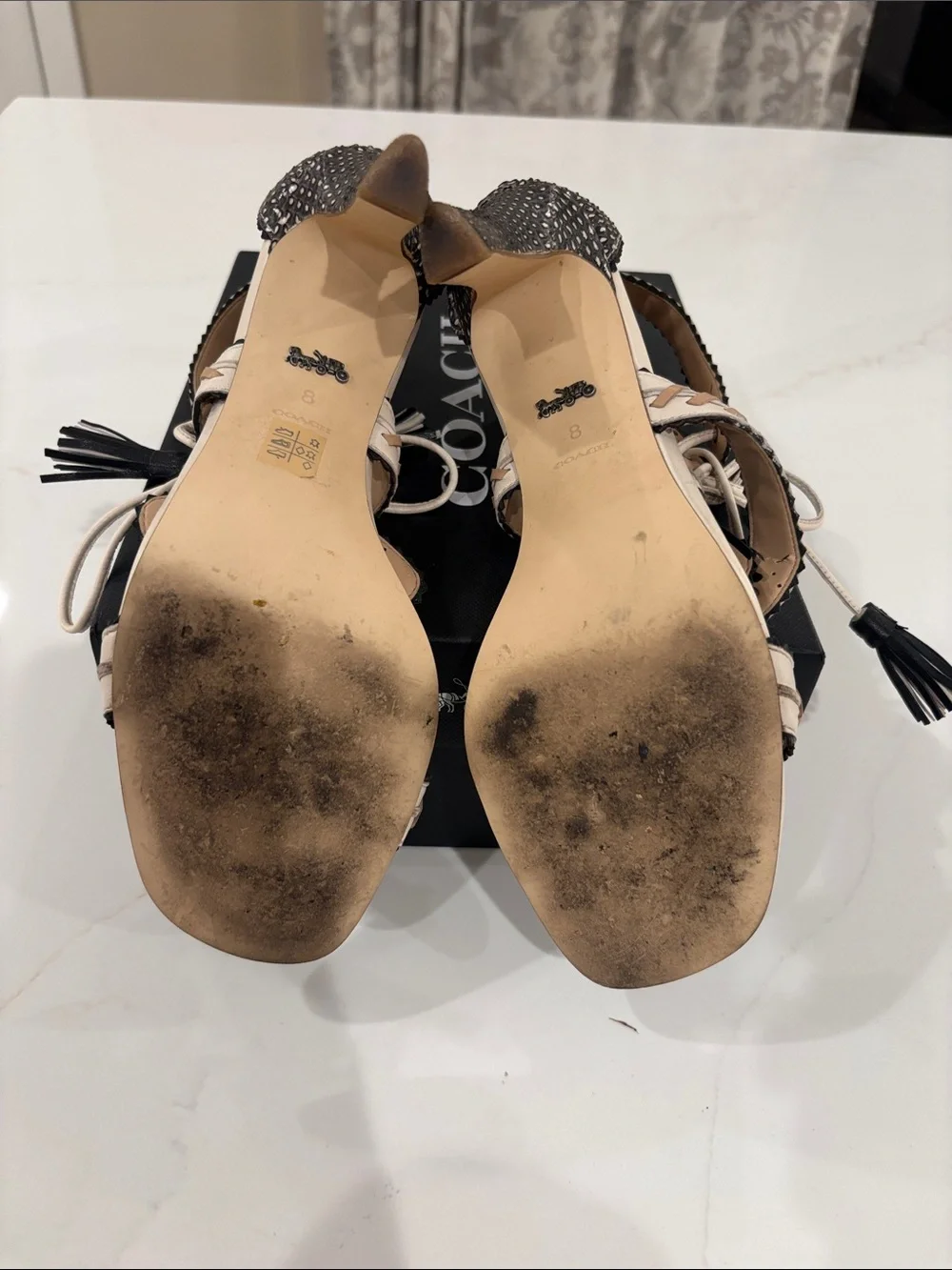 Coach Ivory and Black Studded Tassel High Heel Sandals